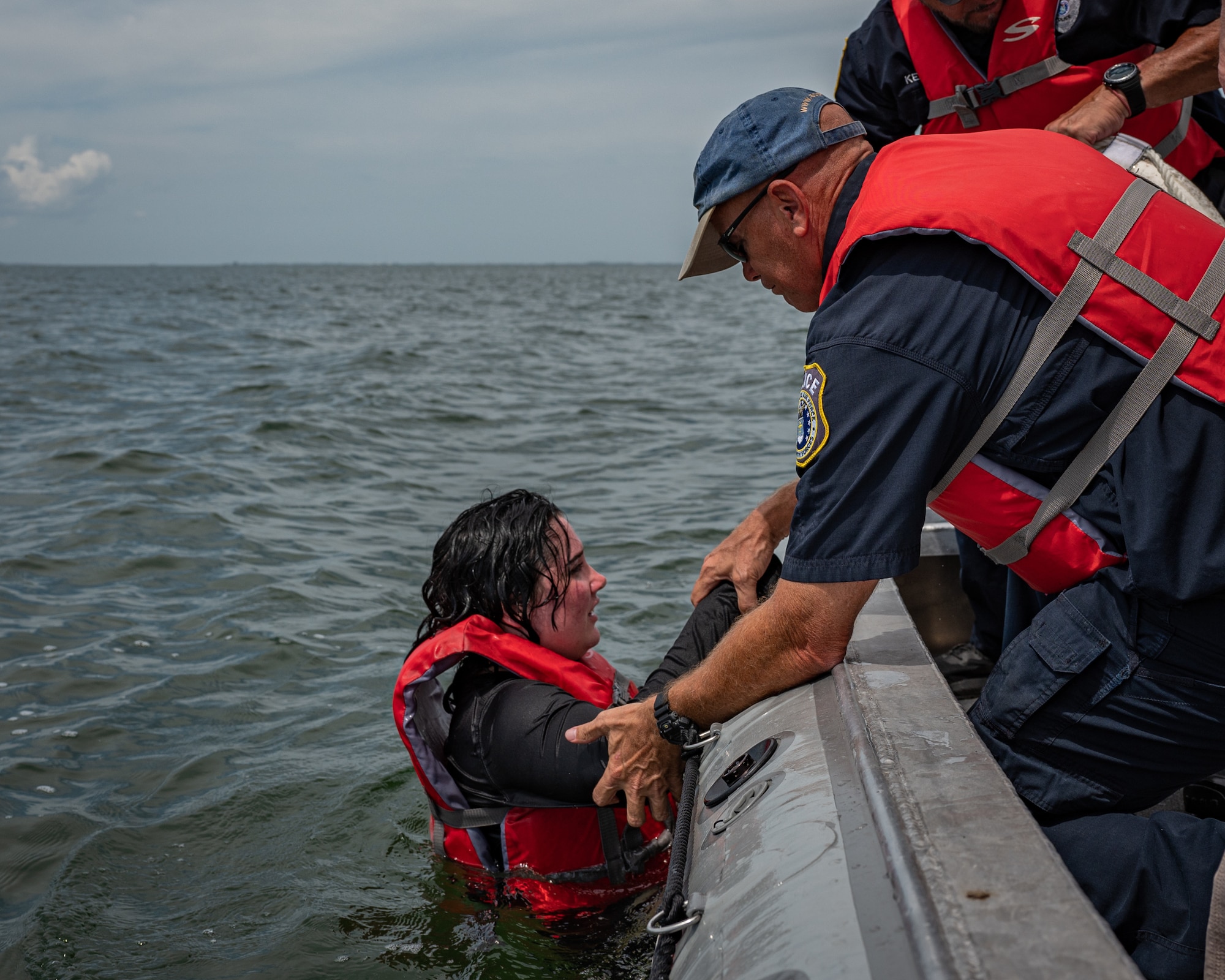 Airman 1st Class Lillian Weaver, left, and James Johnson, right, 45th Security Forces Squadron installation patrolmen, train on maritime operations at Patrick Space Force Base, Fla., April 14, 2022. Twelve defenders graduated the National Association of State Boating Law Administrators boat crew member course certifying them as marine patrolmen. (U.S. Space Force photo by Senior Airman Thomas Sjoberg)