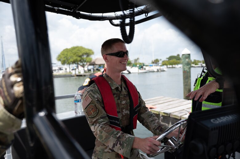 Senior Airman Christopher Scharer, 45th Security Forces Squadron installation patrolman, trains on maritime operations at Patrick Space Force Base, Fla., April 14, 2022. Twelve defenders graduated the National Association of State Boating Law Administrators boat crew member course certifying them as marine patrolmen. (U.S. Space Force photo by Senior Airman Thomas Sjoberg)