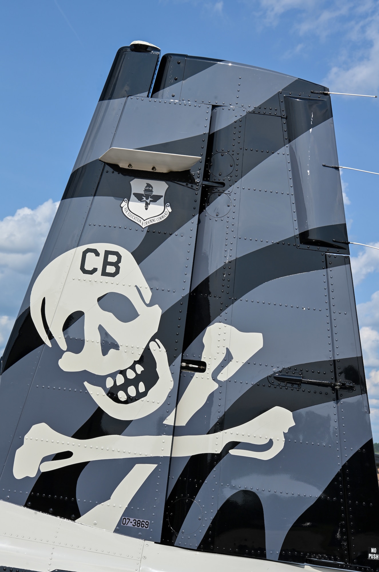 On the tail of the heritage T-6A Texan II is a skull and crossbones, resembling the 14th Flying Training Wing First Assignment Instructor Pilot’s (FAIP) patch worn on the left shoulder of their uniform. (U.S. Air Force photo by Senior Airman Davis Donaldson)