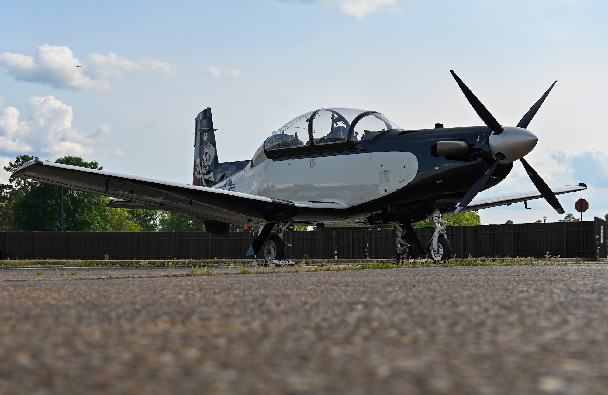 The newly added First Assignment Instructor Pilot (FAIP) heritage T-6A Texan II sits on the flightline for a static display on May 13, 2022, at Columbus Air Force Base, Miss. The T-6 is a single-engine, two-seat primary trainer designed to train Undergraduate Pilot Training, or UPT, students in basic flying skills common to U.S. Air Force and Navy pilots. (U.S. Air Force photo by Senior Airman Davis Donaldson)