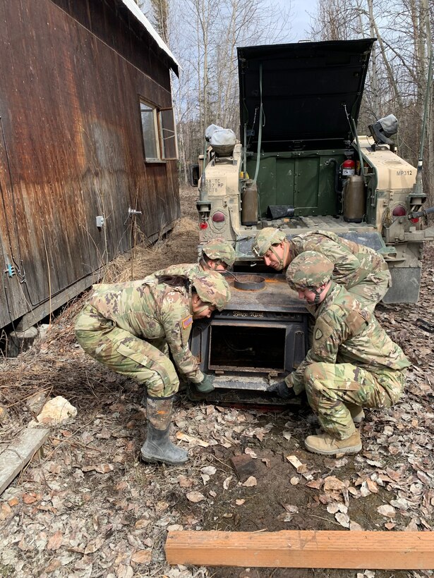 Alaska Army National Guardsmen assist with cleanup and flood recovery efforts in Manley Hot Springs May 14, 2022.