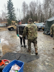 Alaska Army National Guardsmen assist with cleanup and flood recovery efforts in Manley Hot Springs May 12-15, 2022.