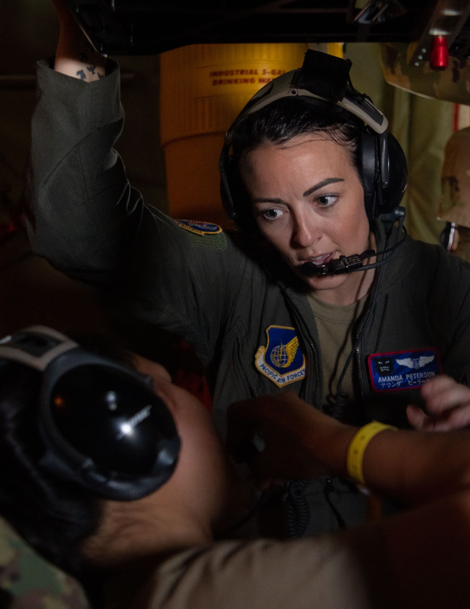 An Airman provides care to a simulated patient.