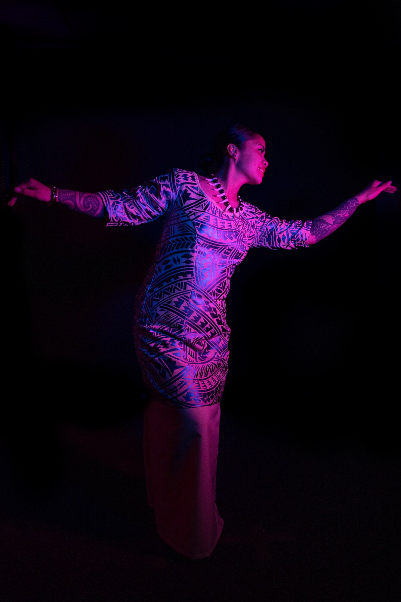 Woman performing traditional Samoa dance