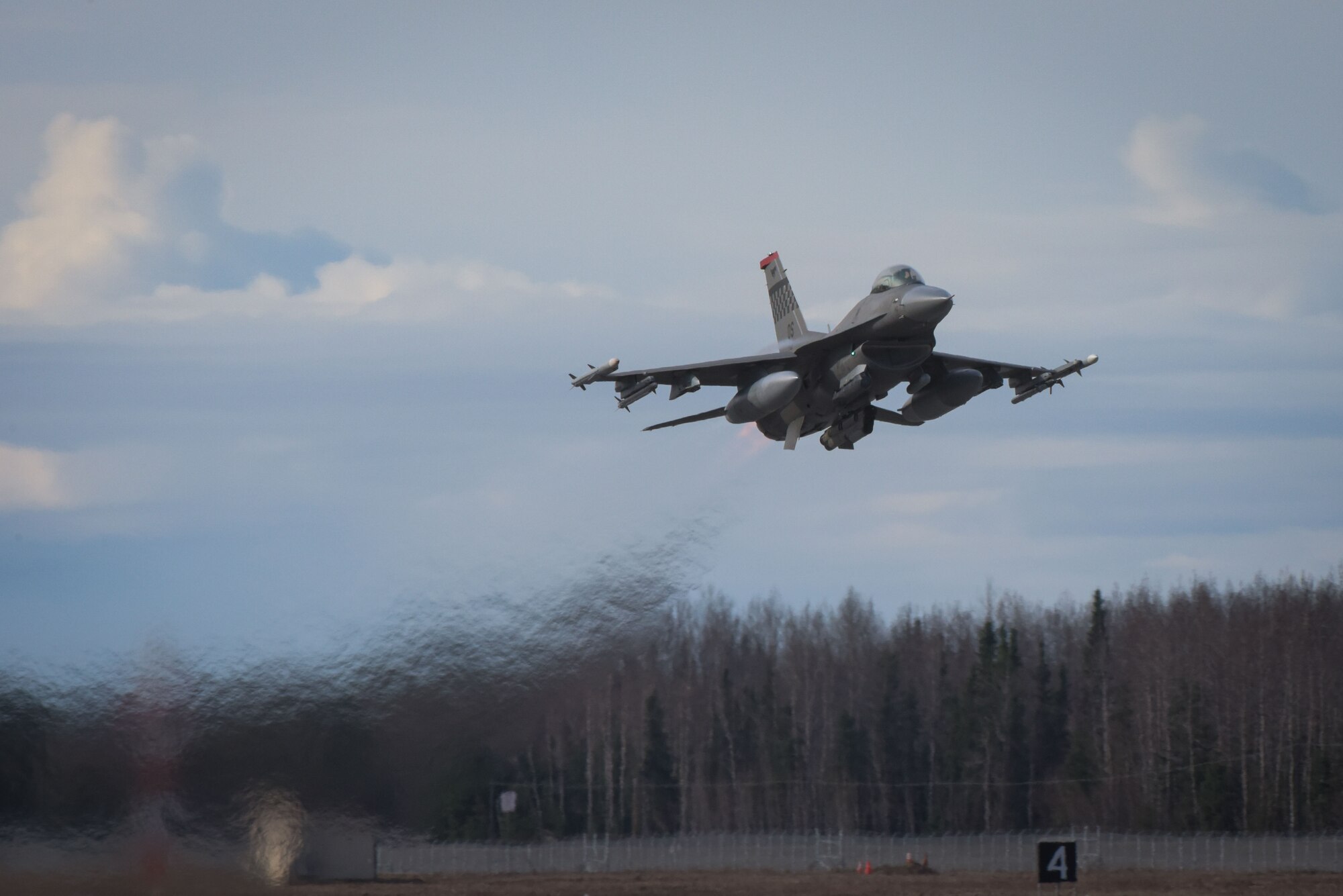An F-16 Fighting Falcon assigned to the 36th Fighter Squadron takes flight during RED FLAG-Alaska 22-1 at Eielson Air Force Base, Alaska, May 7, 2022.