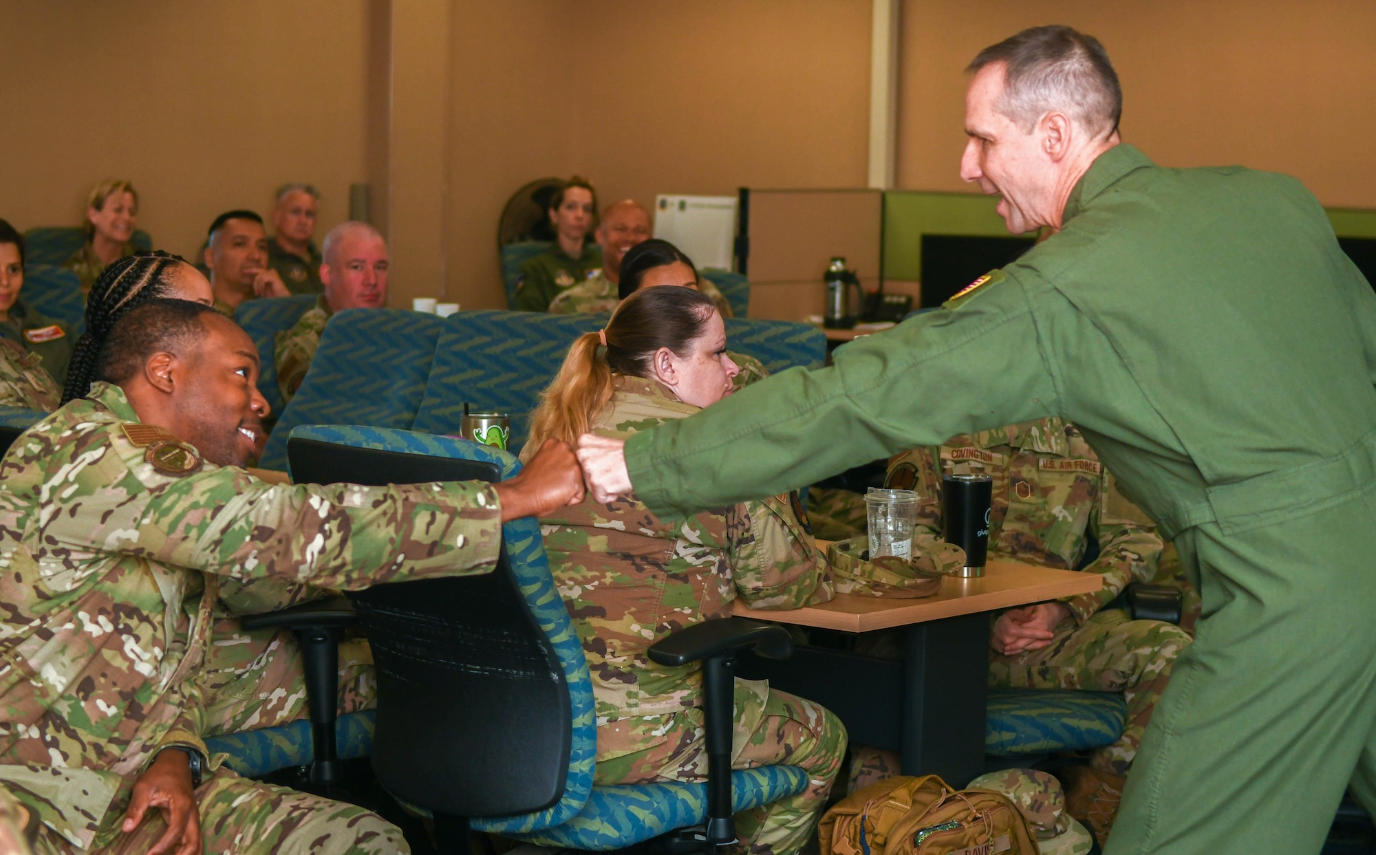 Maj. Gen. Jeffrey Pennington, Commander, Fourth Air Force, acknowledges Senior Master Sgt. Christopher Greene, 916th Aircraft Maintenance Squadron first sergeant from Seymour Johnson Air Force Base, North Carolina, at the Cross Cultural and Diversity & Inclusion Awareness Training at Joint Base San Antonio-Lackland, Texas, May 10, 2022. Pennington visited the 433rd Airlift Wing’s venue to deliver opening remarks regarding the importance of the training to attendees. (U.S. Air Force photo by Airman 1st Class Mark Colmenares)