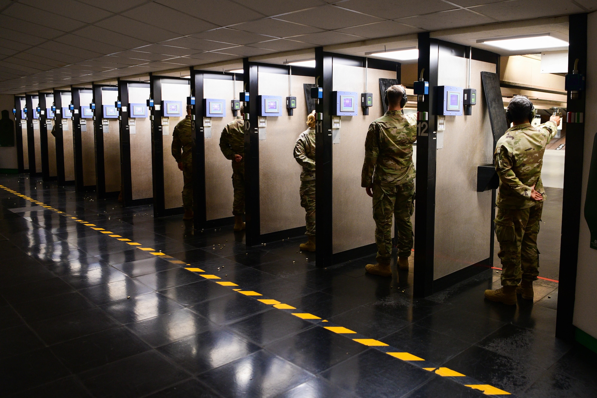 U.S. Air Force Airmen assigned to the 31st Fighter Wing fire M18 Modular Handgun Systems during the 2022 Excellence in Competition Pistol match at Aviano Air Base, Italy, May 17, 2022. Each participant fired an M18 Modular Handgun System with different techniques including one-handed grip, two-handed grip, and rapid fire shots that were modeled Security Forces training during the competition held in honor of Police Week. Police Week is a collaborative effort of many organizations dedicated to honoring America’s law enforcement community. (U.S Air Force photo by Senior Airman Brooke Moeder)