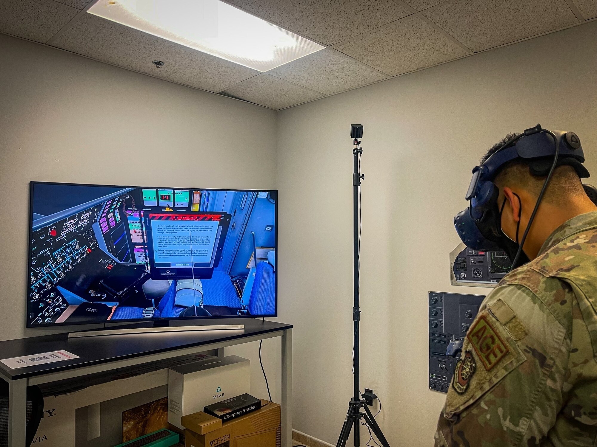 Staff Sgt. Reynaldo Guevarra, 725th Air Mobility Squadron (AMS) aerospace ground equipment craftsman, learns the duties of a crew chief via virtual training during a multi- capable airman (MCA) exercise at Naval Station Rota, Spain, Feb. 11, 2022. During the weeklong MCA exercise, 725th AMS participated in a familiarization of new tasks using real equipment as well as virtual reality training tools. An MCA is critical to enabling agile combat employment, which is a proactive and reactive operational scheme of maneuver designed to address the challenges of projecting combat power across the globe with a significantly reduced global footprint, increased risk from adversarial technological advances, and fiscal and political constraints. (Courtesy photo)