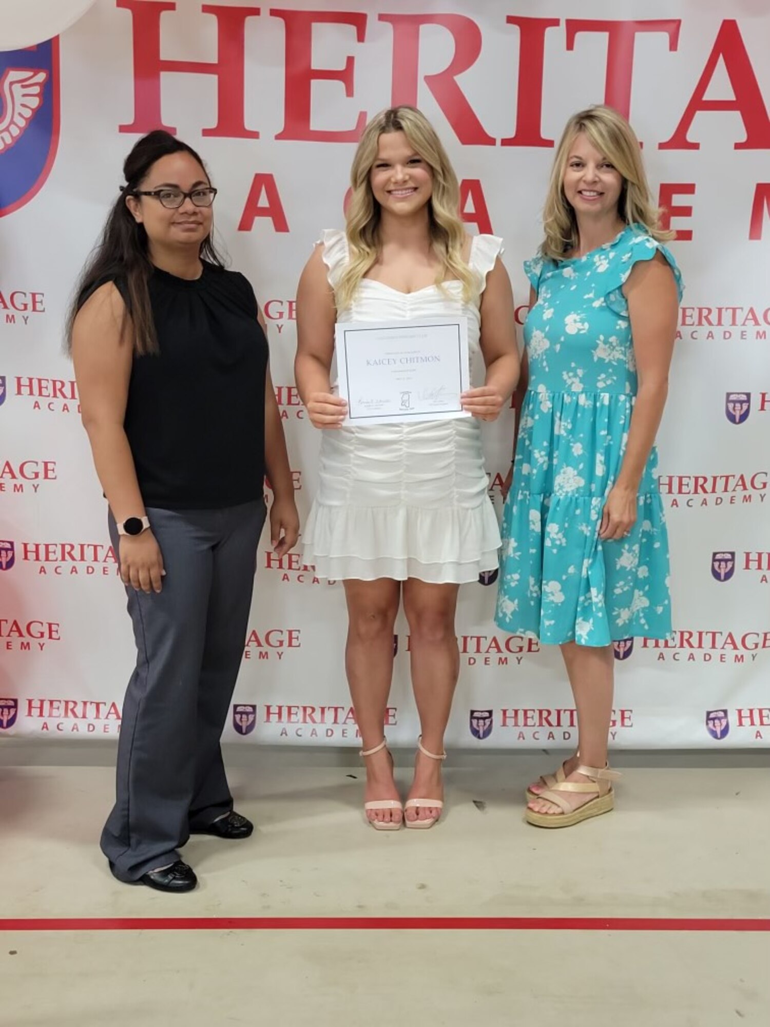 Kaicey Chitmon, is presented a $2,000 scholarship by Brandy Womble, Columbus Spouses Club president, for leadership qualities and community involvement. The CSC promotes the ideals of the United States Air Force through welfare, charitable, socials, and recreational activities. (Courtesy photo)