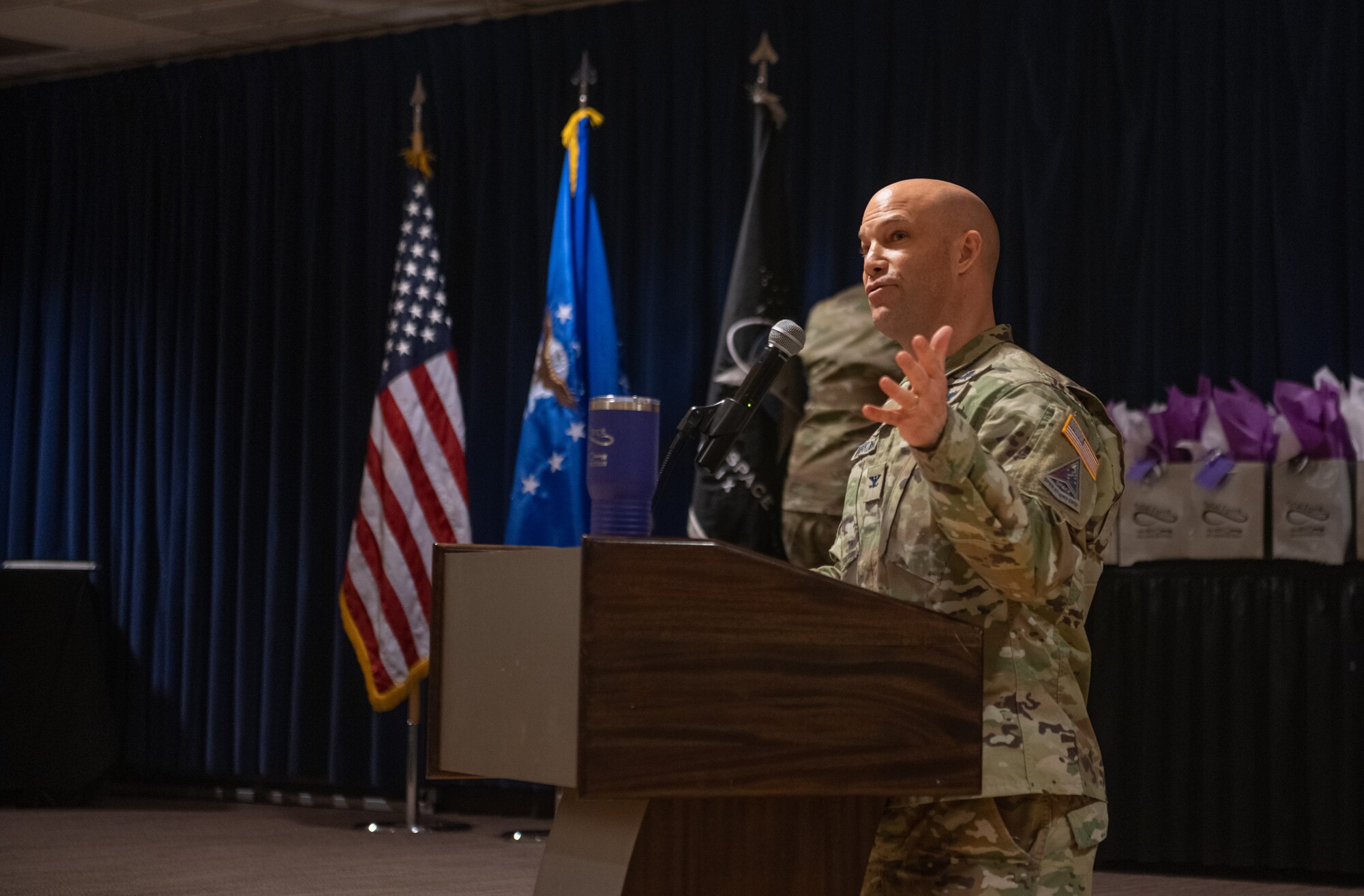 Man speaks at podium