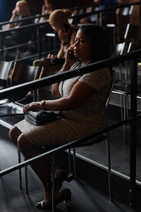 ANSBACH, Germany (May 19, 2022) - General Counsel of the Army, the Honorable Carrie F. Ricci, listens to an audio guide detailing the significance of Courtroom 600 at the Nuremberg Tribunal, Nuremberg, Germany, Monday, May 16, 2022, as part of her tour of V Corps and U.S. Army Garrison Ansbach. V Corps works alongside NATO allies and regional security partners to provide combat ready forces, execute joint and multinational training exercises to improve interoperability, and ensure an appropriate collective posture of deterrence and defense. (U.S. Army photo by Pfc. Destinee Rodriguez)