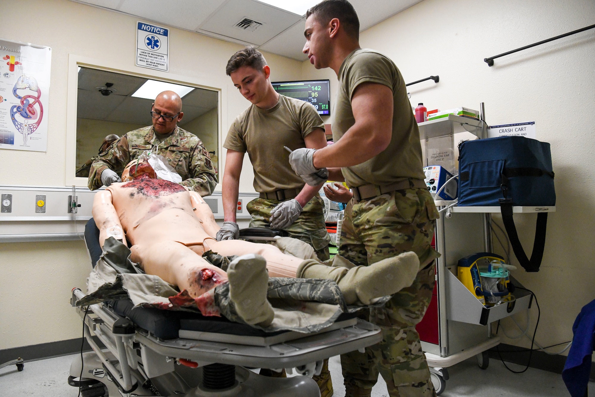 N.Y. Air National Guard 106th Rescue Wing Airman First Class David Mangiameli, a 106th combat medic, intubates a “patient,” an advanced medical simulation dummy, at Joint Base Elmendorf-Richardson in Anchorage, Alaska, May 5, 2022. The combat medics of the 106th Medical Group participated in their first Military Facility Annual Training since the start of the COVID-19 pandemic, and were expected to encounter a patient, assess the injuries, mitigate the risk, stop bleeding, treat secondary wounds, and/or resuscitate the patient and maintain the airway. (Air National Guard photo by SSgt Daniel H. Farrell)