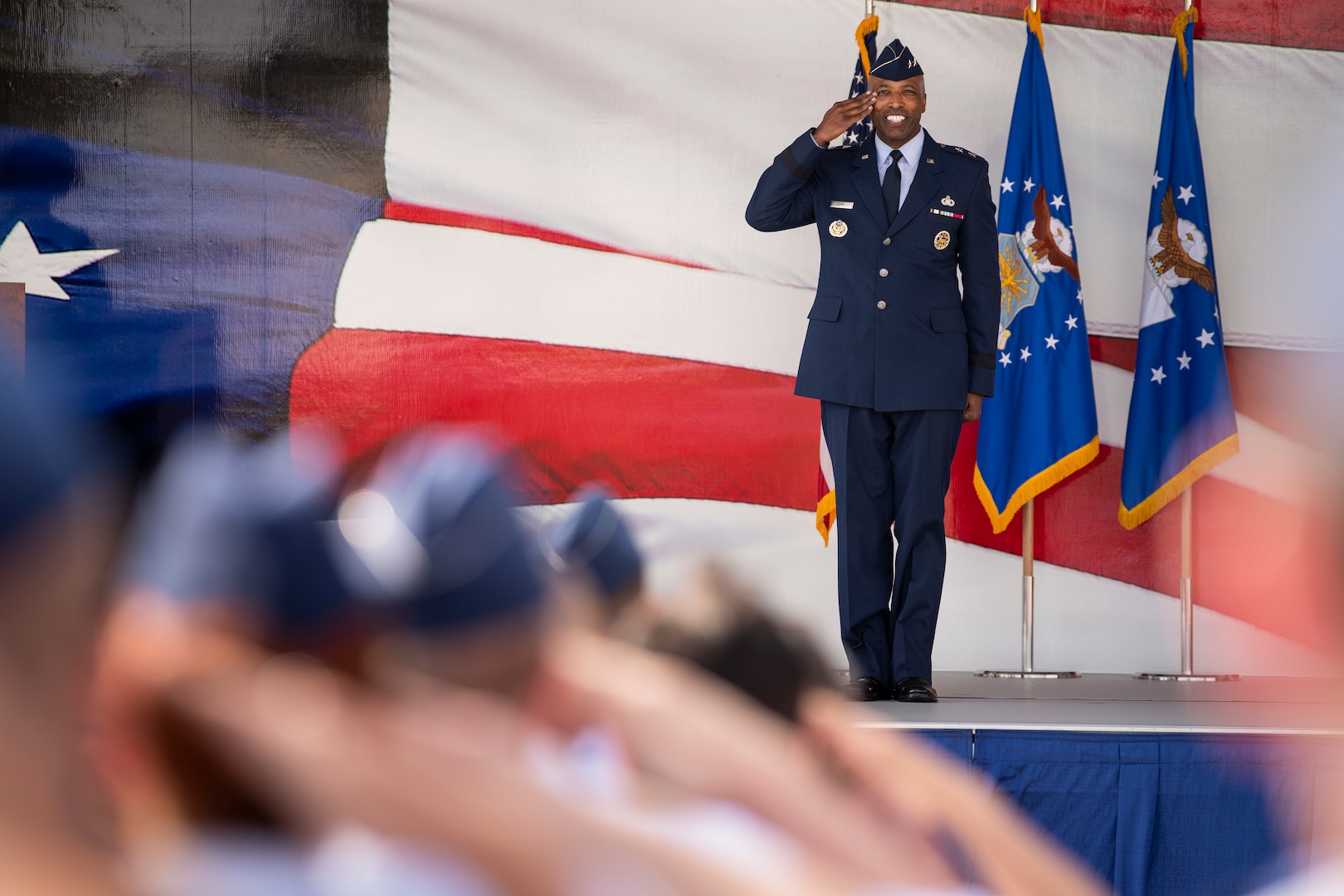 Maj. Gen. Troy Dunn receives his first salute from the members of the Air Force's Personnel Center during a change of command ceremony at Joint Base San Antonio-Randolph, Texas, May 18, 2022.