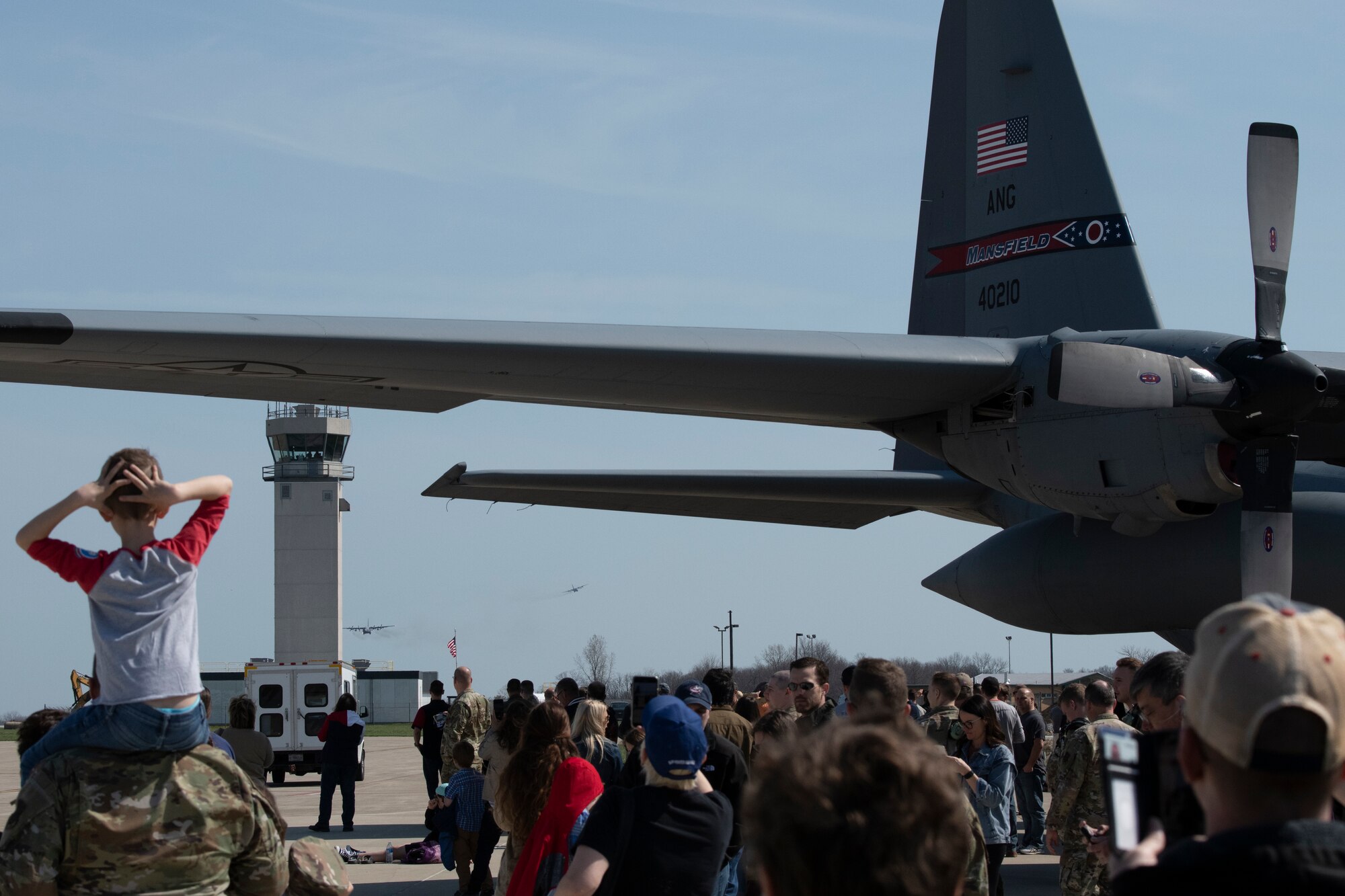 164th Airlift Squadron members conduct the ceremonial final formation flight of two C-130H Hercules during the 179th Airlift Wing Flying Legacy ceremony at Mansfield Lahm ANGB, Ohio, April 23, 2022