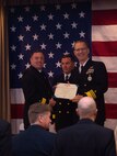 Vice Adm. Yancy Lindsey, commander, Navy Installations Command, presents Rear Adm. Brad Collins, outgoing commander of Navy Region Northwest, with the Legion of Merit Medal during a change of command ceremony at Naval Base Kitsap-Bangor, Washington May 12, 2022.  During the ceremony, Rear Adm. Mark Sucato relieved Collins as commander, Navy Region Northwest. (U.S. Navy photo by Mass Communication Specialist 2nd Class Ian Zagrocki)