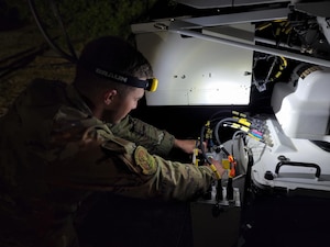 U.S. Air Force Staff Sgt. Zachary Williams, a knowledge operations management technician with the 280th Special Operations Communications Squadron, Hall Air Guard Station, Dothan Regional Airport, Alabama, works on communication satellites during Emerald Warrior 22.1 at Hurlburt Field, Florida, May 11, 2022.