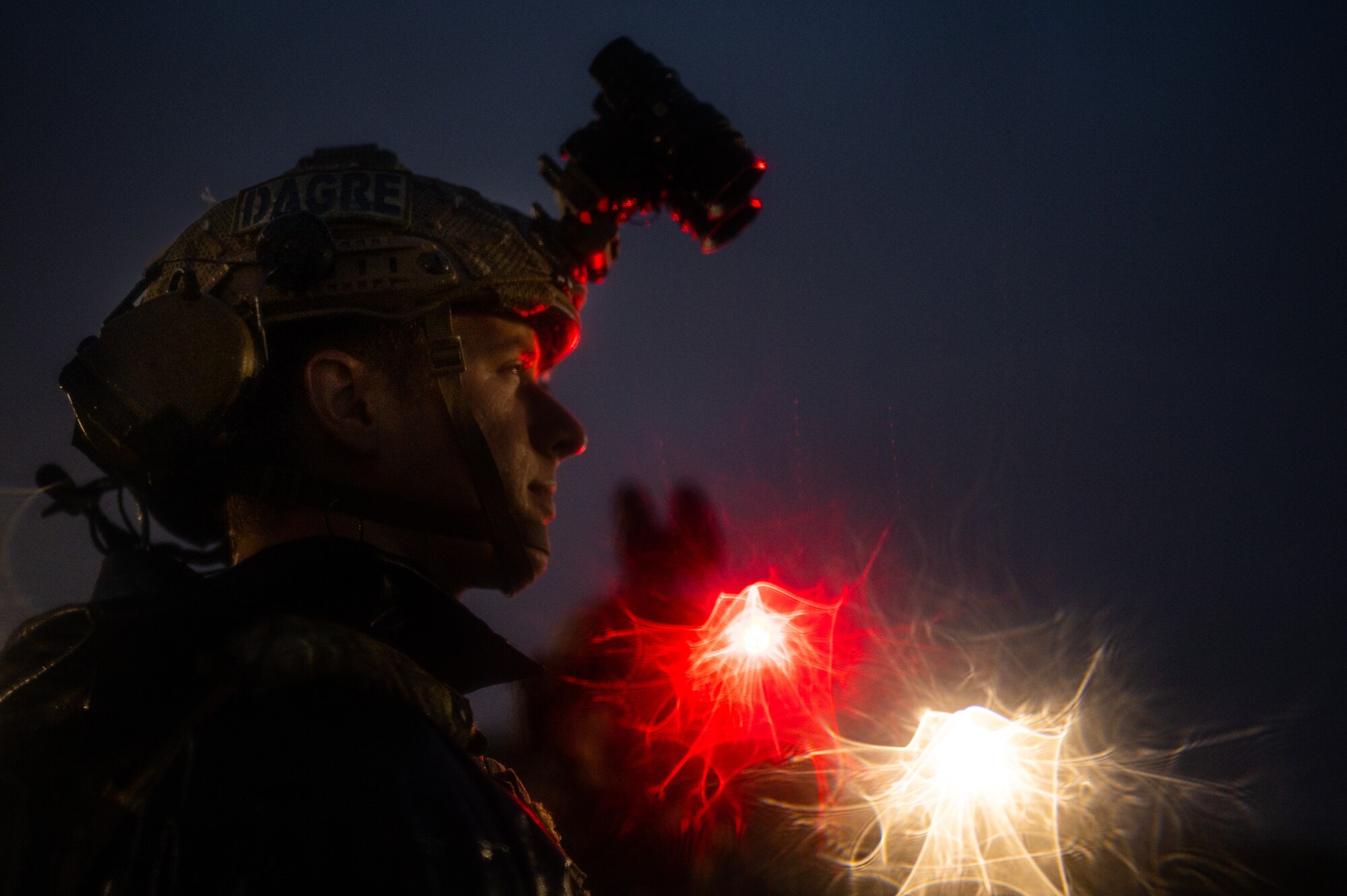 Airman observes training.