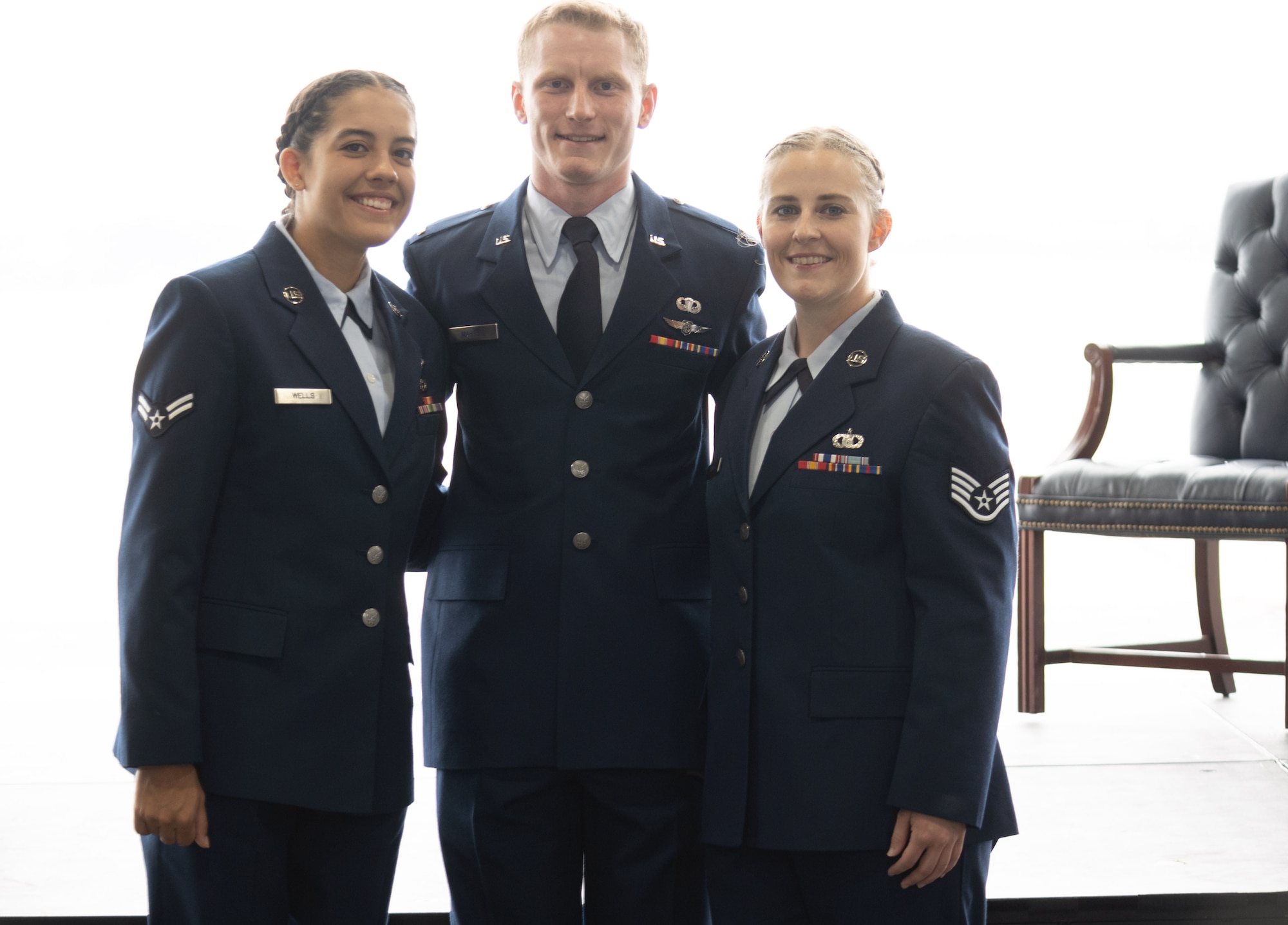 U.S. Air Force Airman 1st Class Trinity Wells, ceremony guidon proffer, 2nd Lt. Jonathan Martell, ceremony narrator, and Staff Sgt. Jacqueline Silva, ceremony guidon proffer, pose for a photo after the 5th Combat Weather Group Activation Ceremony at Fort Bragg, NC, May 5, 2022. The 5th Combat Weather Group is the first combat weather group in DoD history. (Courtesy photo)