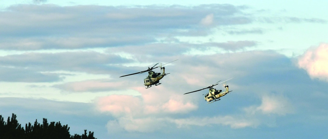 Marine Corps AH-1Z Viper and UH-1Y Venom stationed with Air Test and Evaluation Squadron (HX) 21 take off from Naval Air Station Patuxent River on the first successful mixed fleet Link 16 flight.