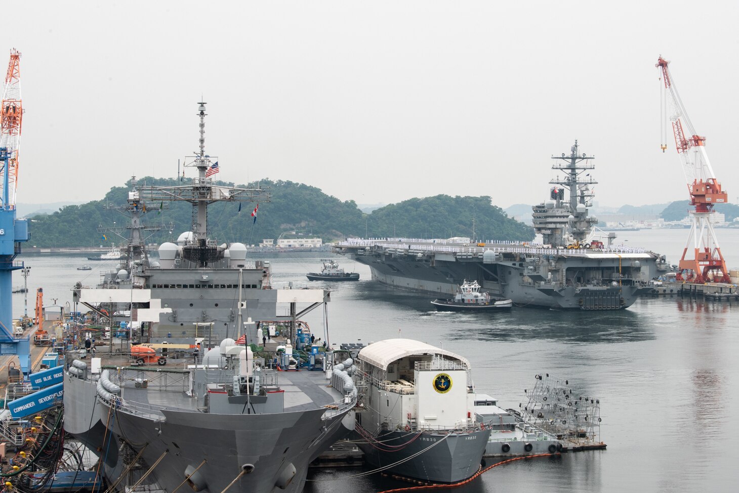 The U.S. Navy’s only forward-deployed aircraft carrier USS Ronald Reagan (CVN 76) departs Commander, Fleet Activities Yokosuka (CFAY) for a regularly scheduled deployment, May 20, 2022. Ronald Reagan is deployed to the U.S. 7th Fleet area of operations in support of a free and open Indo-Pacific region. For more than 75 years, CFAY has provided, maintained, and operated base facilities and services in support of the U.S. 7th Fleet’s forward-deployed naval forces, tenant commands, and thousands of military and civilian personnel and their families. (U.S. Navy photo by Tetsuya Morita)