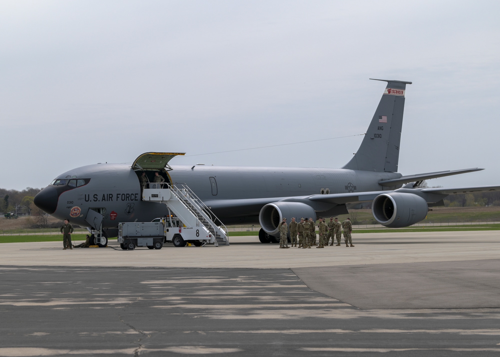 Airmen board a KC-135 Stratotanker aircraft.