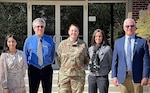 From left, Hamna Khan; Thomas Renkevens; Col Anne-Marie Contreras; Dr. Lisa Mazzuca; and Steven Kelly, after they met to discuss NASA’s second-generation emergency beacons, the Satellite-aided Search and Rescue, or SARSAT, program. 

The group from NASA and NOAA visited the Joint Personnel Recovery Agency headquarters, on Fort Belvoir, Va.