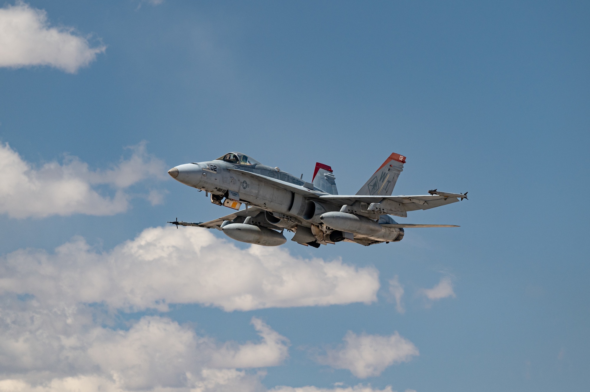 An F/A-18D Hornet assigned to the Marine All Weather Fighter Attack Squadron 533 takes off in participation of Black Flag 22-1, Nellis Air Force Base, Nevada, May 11, 2022. Black Flag identifies enhancements to U.S. and Coalition night one capabilities against our pacing competitiors. (U.S. Air Force photo by Airman Trevor Bell)