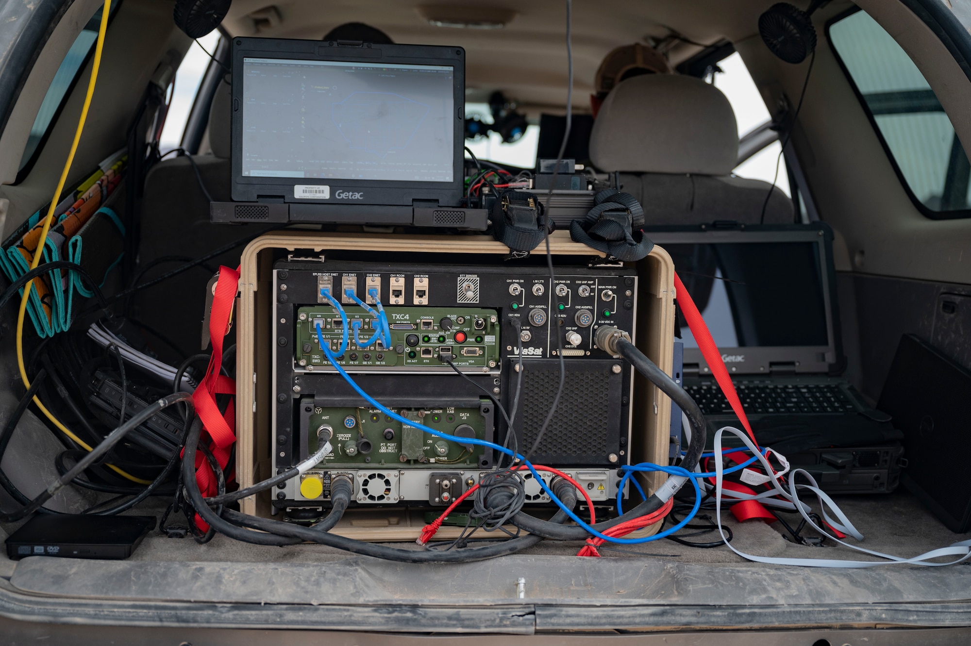 Mobile C2 components sit in vehicle.