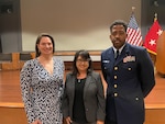 Lianne Casupang, District 14’s Sexual Assault Response Coordinator and the Coast Guard’s SARC of the Year for 2022, is recognized during a ceremony at the Mark Center in Washington, D.C, May 17, 2022. Pictured from left to right: Lindsay Charles, Coast Guard SAPRR Oversight & Policy Office Chief, Lianne Casupang, and Cmdr. Michael Wolfe, Coast Guard Liaison to the Department of Defense Sexual Assault Prevention and Response Office. (U.S. Coast Guard photo.)