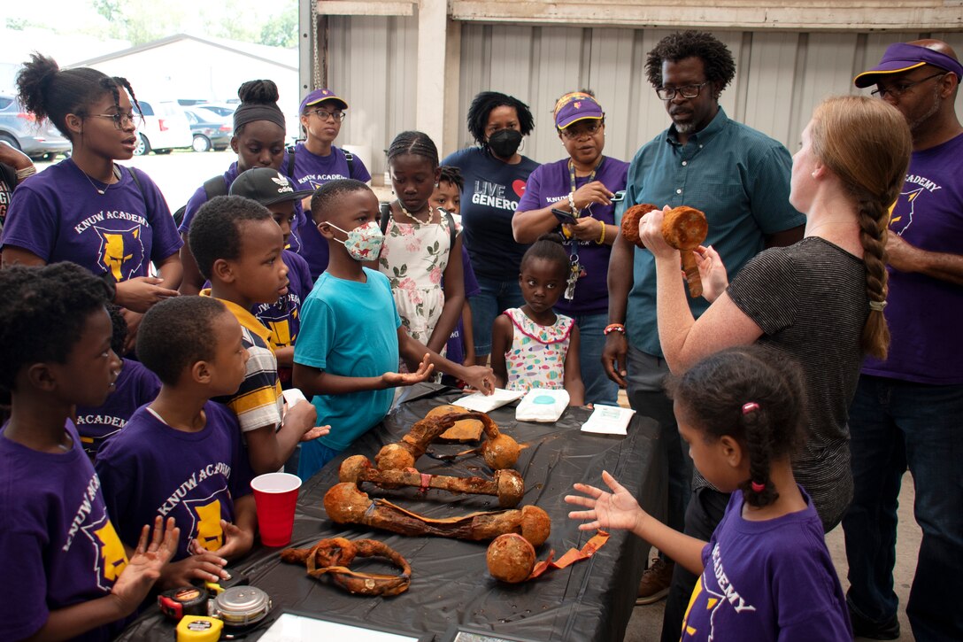 SAVANNAH, Ga. – Andrea Farmer, right, an archaeologist with the U.S Army Corps of Engineers, Savannah District, talks to students and chaperones from Education Through Exploration, a Savannah homeschool co-op, during their visit the Engineers Depot in Savannah, Georgia May 18. During the visit, Farmer and biologist Pamela Backus provided overviews to the students overviews from their respective fields in relation to the Savannah Harbor Expansion Project and the recently discovered Revolutionary War-era artifacts found in the Savannah Harbor. USACE Photo by Mel Orr.