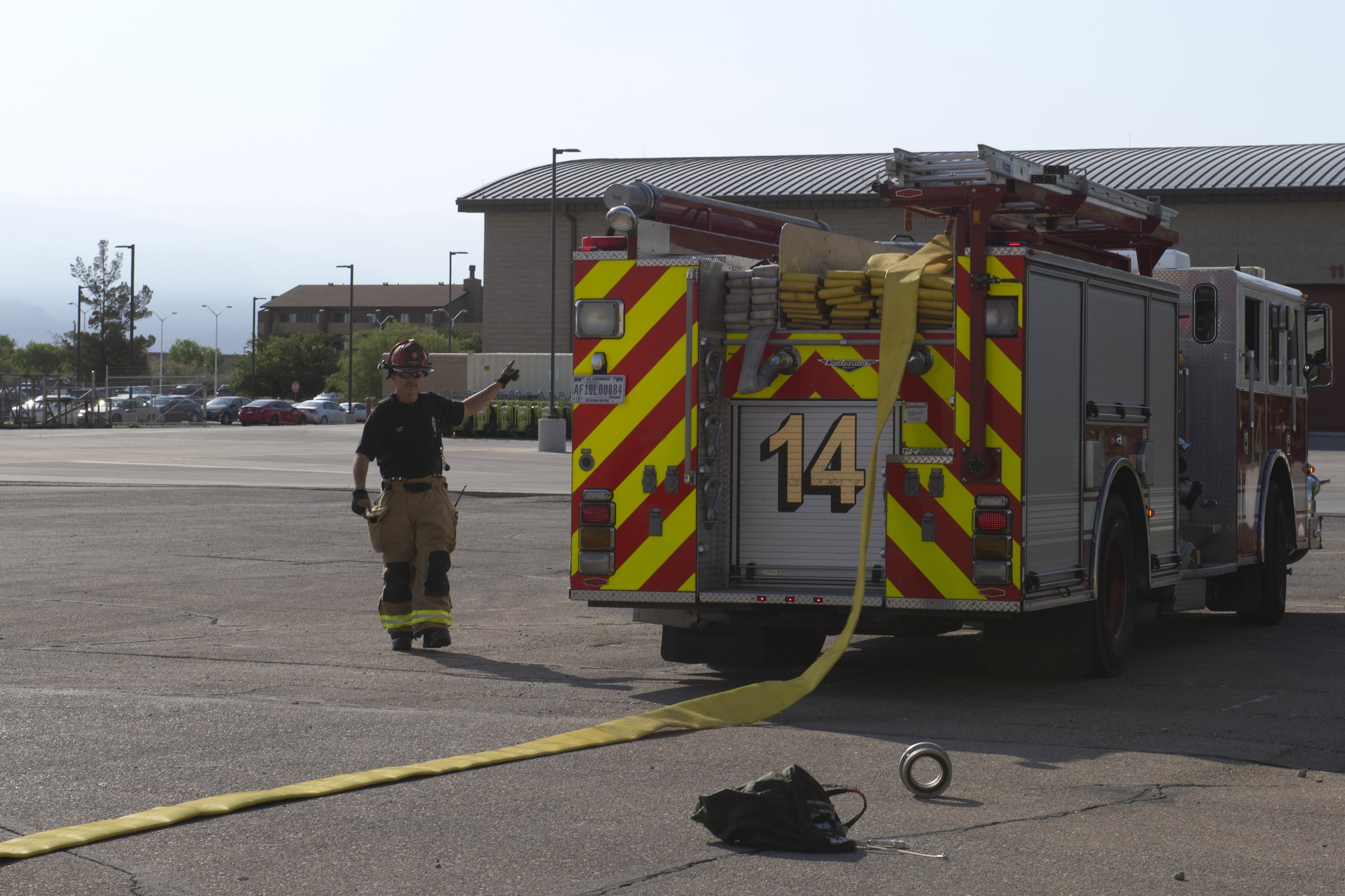 Norman Bloom, 49th Civil Engineer Squadron company officer, directs firefighters during an emergency response training exercise, May 19, 2022, on Holloman Air Force Base, New Mexico.