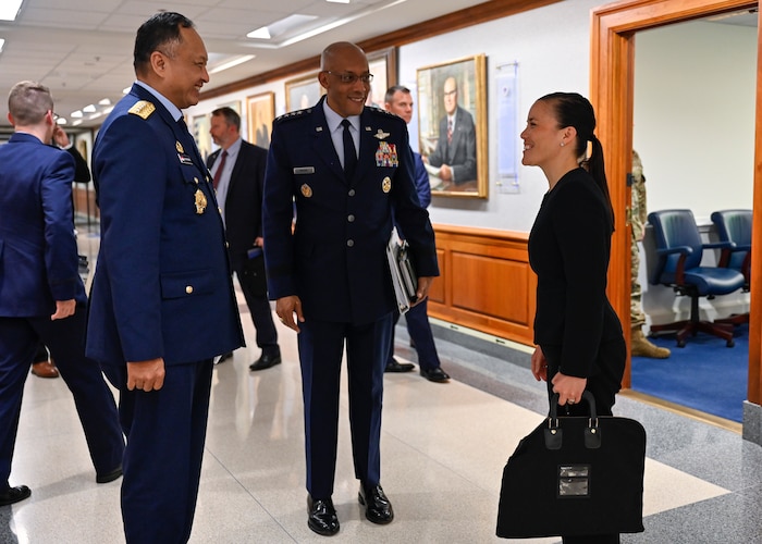 Undersecretary of the Air Force Gina Ortiz Jones speaks with Air Chief Marshal Fadjar Prasetyo, chief of staff of the Indonesian Air Force, before a meeting between Prasetyo and Air Force Chief of Staff Gen. CQ Brown, Jr. at the Pentagon, Arlington, Va., May 19, 2022. Brown and Prasetyo discussed partnership between their services. (U.S. Air Force photo by Eric Dietrich)