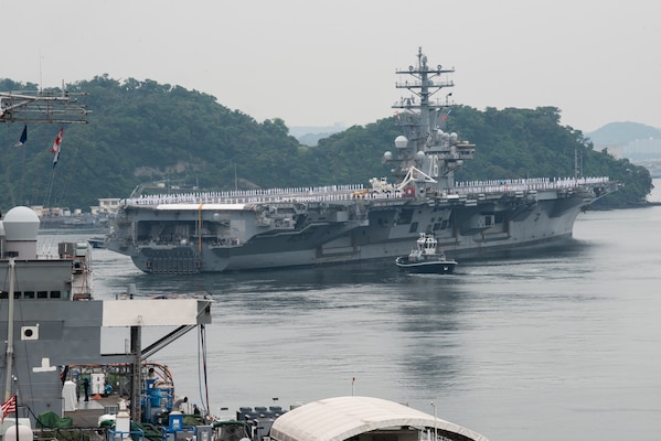 The U.S. Navy’s only forward-deployed aircraft carrier USS Ronald Reagan (CVN 76) departs Commander, Fleet Activities Yokosuka (CFAY) for a regularly scheduled deployment, May 20, 2022. Ronald Reagan is deployed to the U.S. 7th Fleet area of operations in support of a free and open Indo-Pacific region. For more than 75 years, CFAY has provided, maintained, and operated base facilities and services in support of the U.S. 7th Fleet’s forward-deployed naval forces, tenant commands, and thousands of military and civilian personnel and their families. (U.S. Navy photo by Tetsuya Morita)