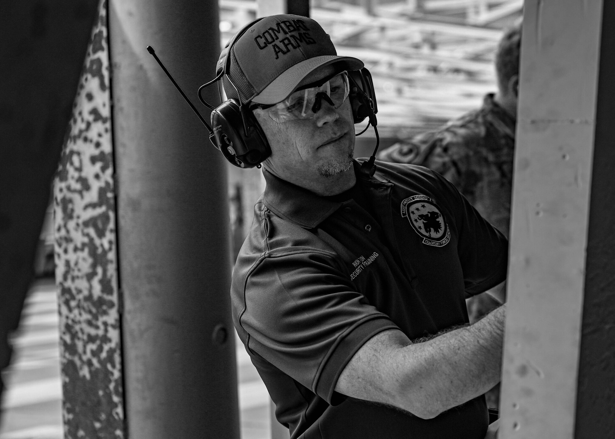 Rich Thompson, 633d Security Forces Squadron training supervisor, evaluates a target during the 633d SFS Excellence in Competition tournament at Joint Base Langley-Eustis, Virginia, May 19, 2022.
