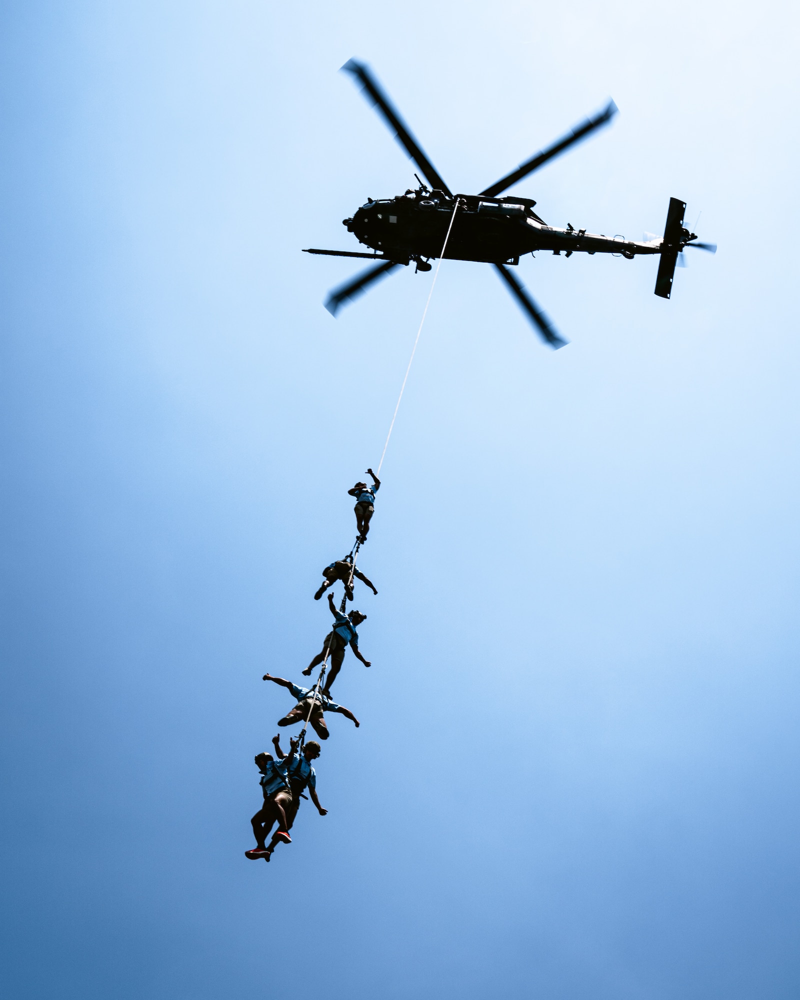 U.S. Special Operations Command members are rappelled up to a helicopter during a Special Operations Forces (SOF) demonstration in Downtown Tampa, Florida, May 18, 2022.
