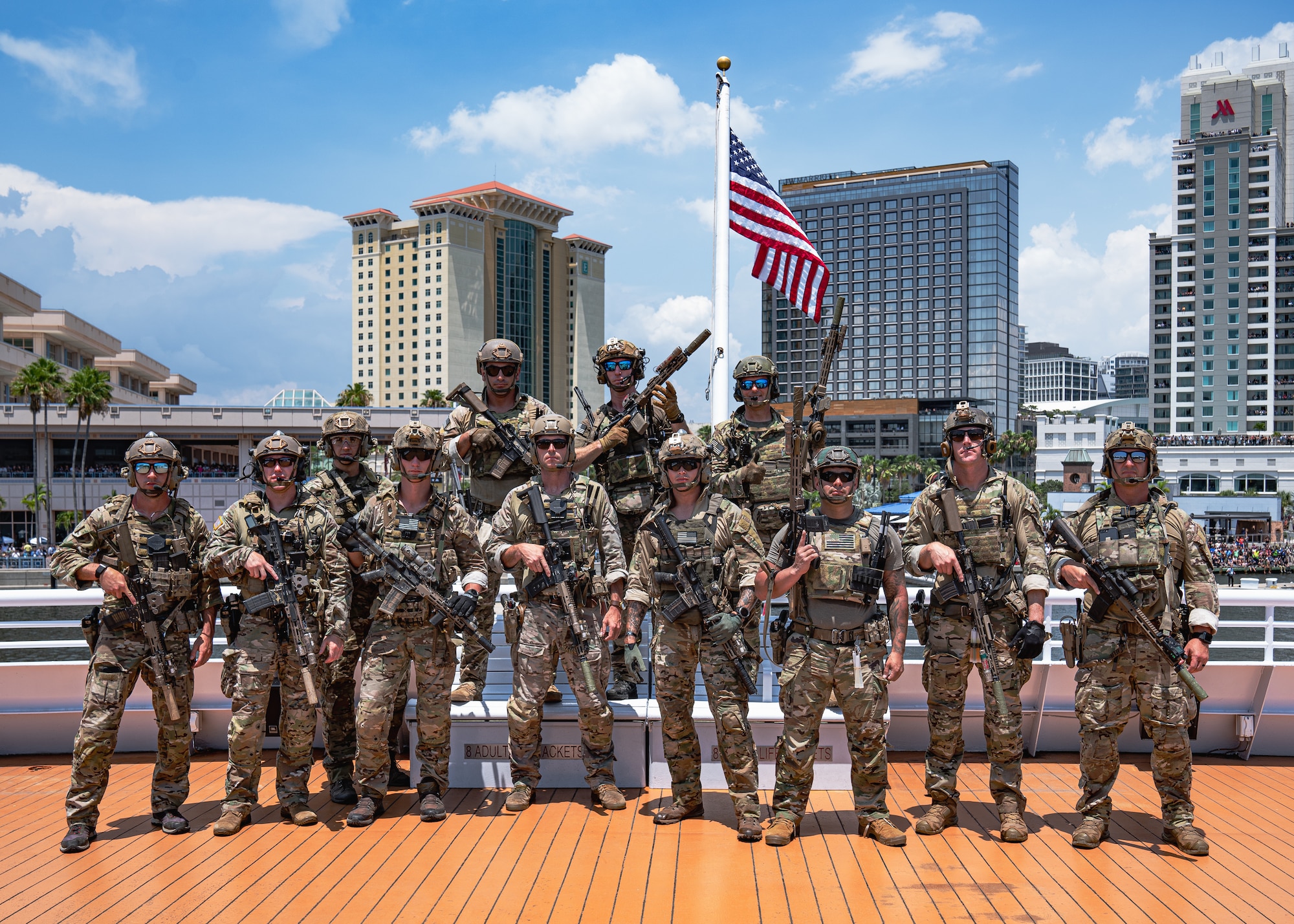 Members assigned to U.S. Special Operations Command pose for a photo following a Special Operations Forces (SOF) demonstration in Tampa, Florida, May 18, 2022.