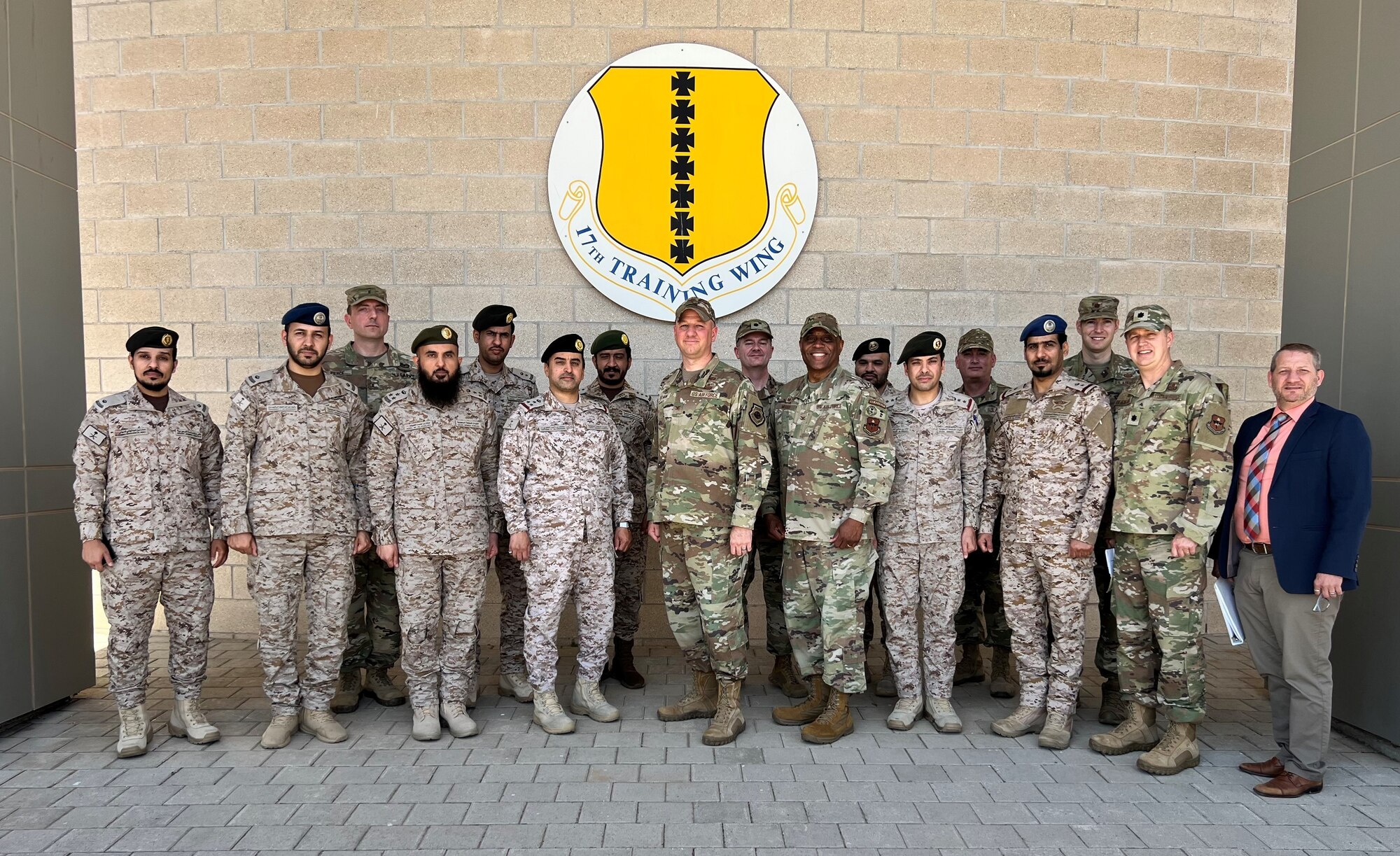 Members of the Royal Saudi Air Forces and members of the 17th Training Wing pose for a photo at Goodfellow Air Force Base, May 18, 2022. Members of the RSAF visited Goodfellow AFB to learn about the joint and coalition forces intelligence, surveillance, and reconnaissance training provided by the 17th TRW. (U.S. Air Force Photo by Senior Airman Michael Bowman