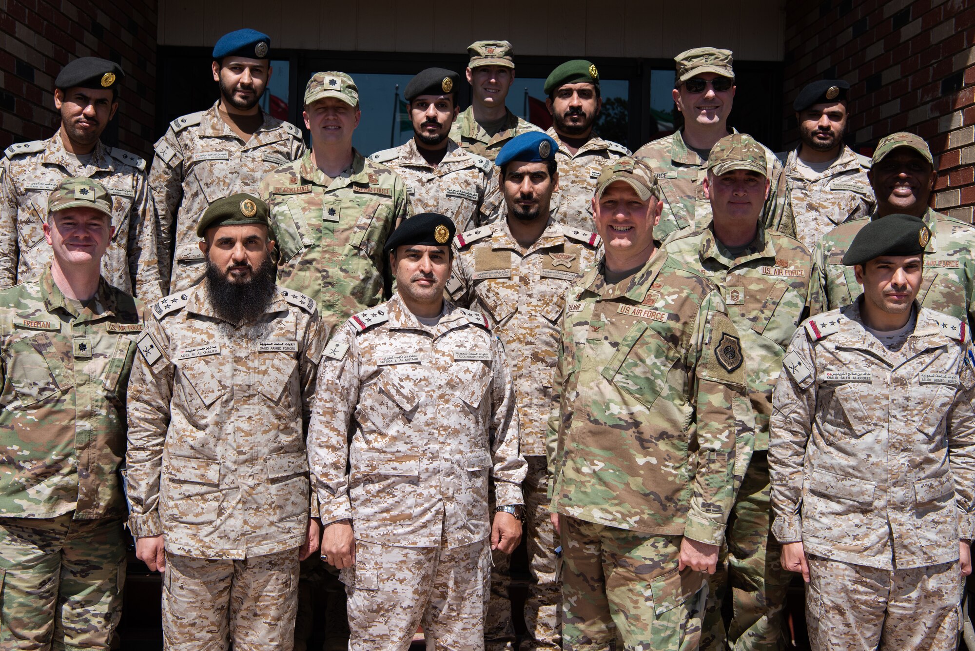 Members of the Royal Saudi Air Forces and members of the 17th Training Wing pose for a photo at Goodfellow Air Force Base, May 18, 2022. Members of the RSAF visited Goodfellow AFB to learn about the joint and coalition forces intelligence, surveillance, and reconnaissance training provided by the 17th TRW. (U.S. Air Force Photo by Senior Airman Michael Bowman)