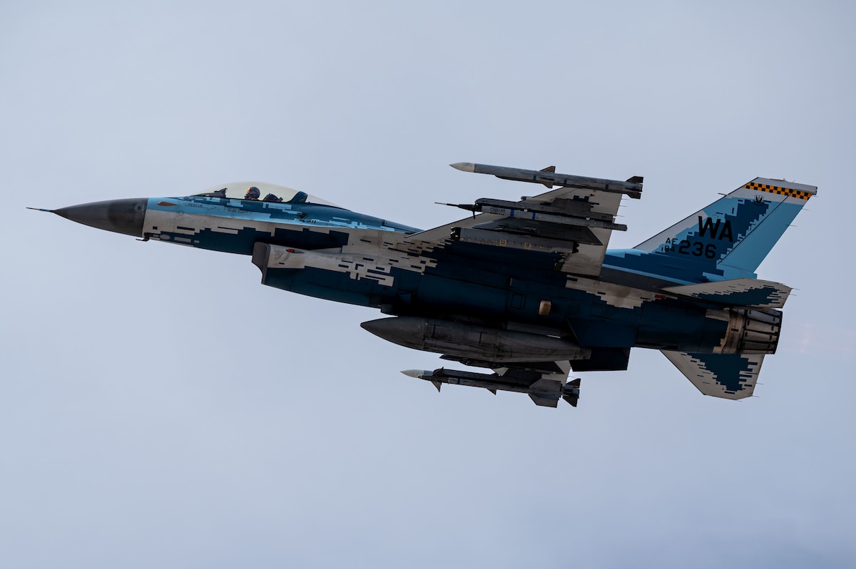 An F-16C Fighting Falcon assigned the 64th Aggressor Squadron takes off during Black Flag 22-1 at Nellis Air Force Base, Nevada, May 10, 2022. The mission of the Aggressor Squadron is to prepare warfighters to win in air combat against any pacing competitors. (U.S. Air Force photo by Airman 1st Class Josey Blades)