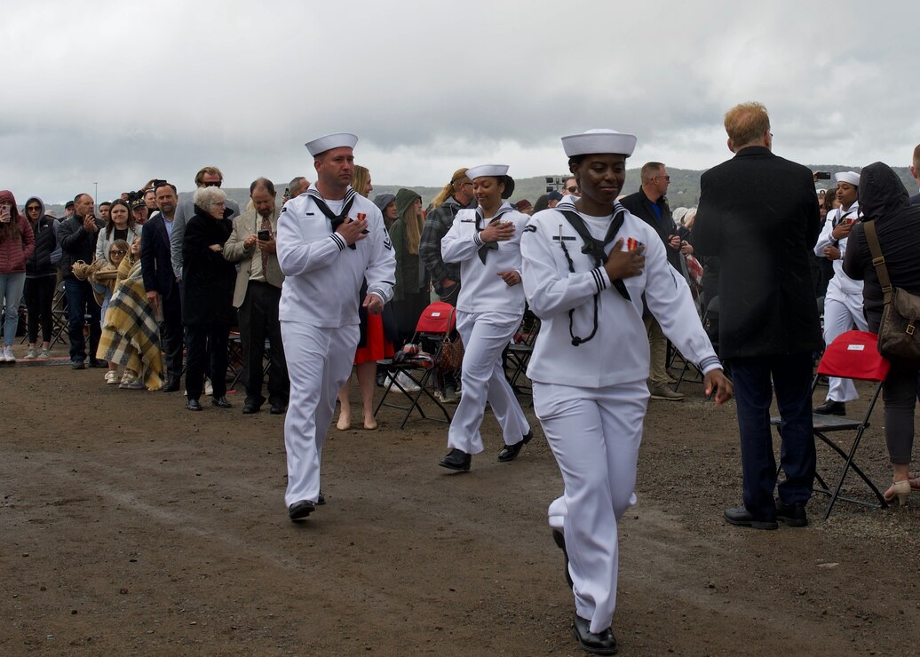 Sailors man the ship during the commissioning ceremony of the Freedom-variant littoral combat ship USS Minneapolis-Saint Paul (LCS 21) in Duluth, Minnesota.