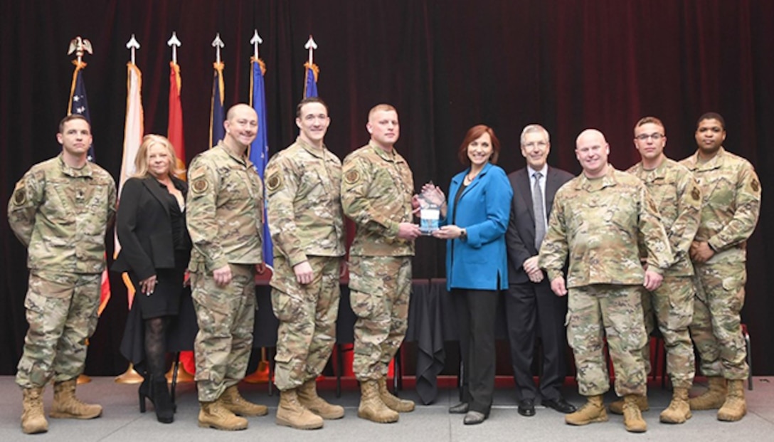 DLA Aviation representatives receive the 2021 Defense Department Supply Chain Excellence Award