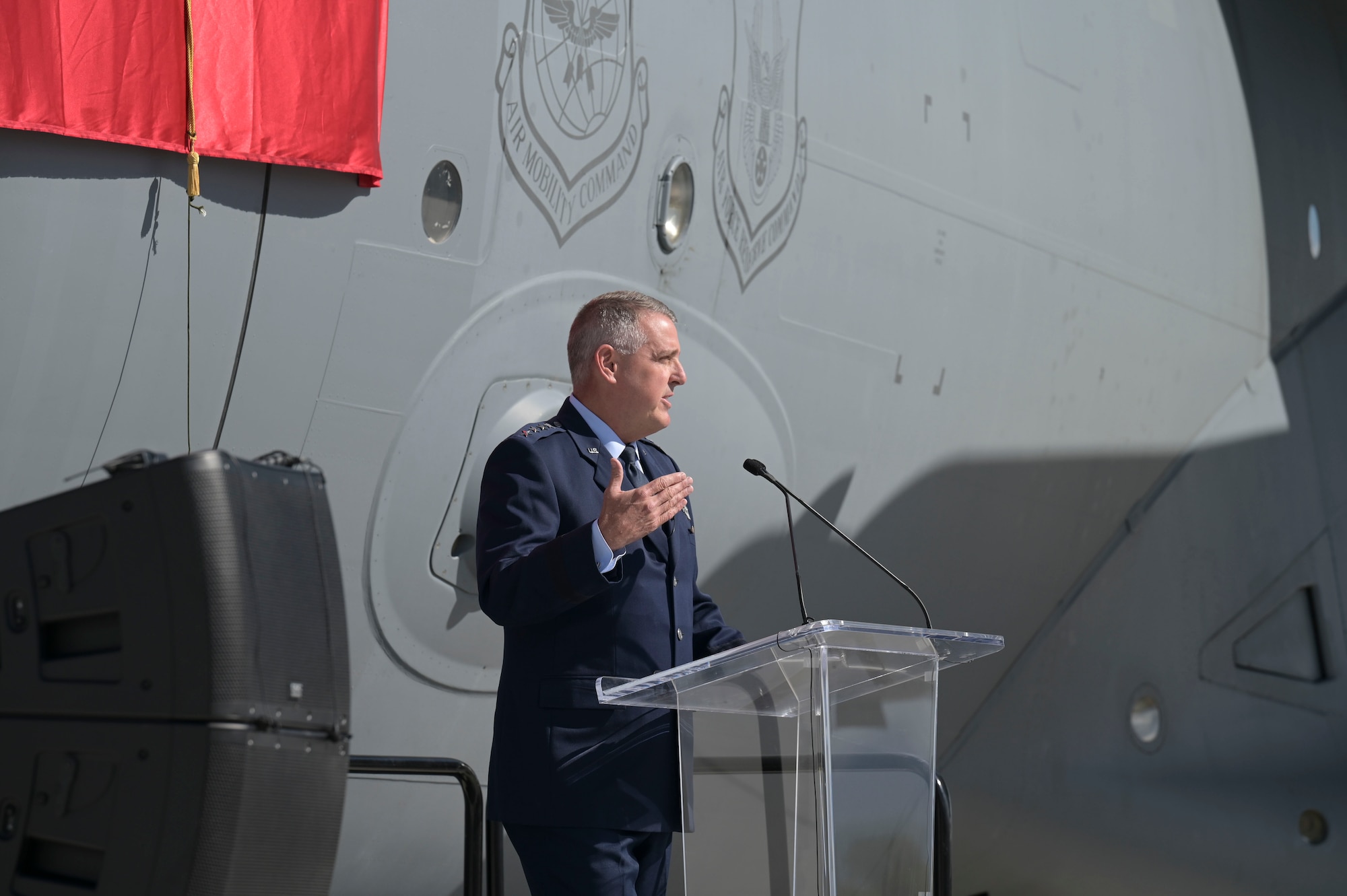 U.S. Air Force Gen Mike Minihan, Air Mobility Command commander, speaks before unveiling the C-17 Globemaster III  that was renamed to "Spirit of the Candy Bomber" in Provo, Utah, May 20, 2022.