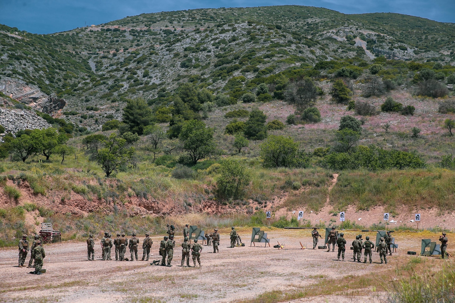 U.S. Marines assigned to Task Force 61/2, conduct a live-fire training evolution with the Hellenic Special Forces during exercise Alexander the Great 22, Greece, May 10, 2022. Alexander the Great 22 strengthens interoperability and force readiness between the U.S., Greece, and Allied nations, enhancing strategic defense and partnership while promoting security and stability in the region. (U.S. Marine Corps photo by Lance Cpl. Emma Gray)