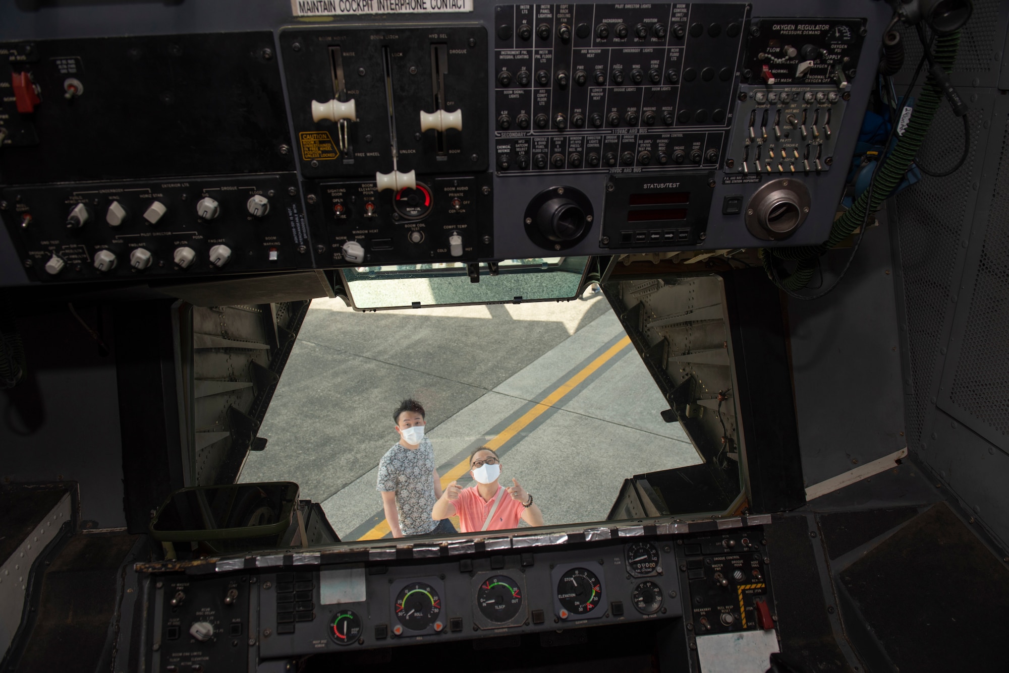 Friendship Festival attendees look through the air refueling operators station of a KC-10 Extender assigned to 9th Air Refueling Squadron from Travis Air Force Base, California, during Friendship Festival 2022, at Yokota Air Base, Japan, May 22. The two-day festival was an opportunity for visitors to learn more about the U.S. and Japan bilateral partnership, while strengthening the bonds between Yokota and the local communities. Yokota was able to host the event with the support of Japan Self-Defense Force, sister services and the local community. (U.S. Air Force photo by Machiko Arita)