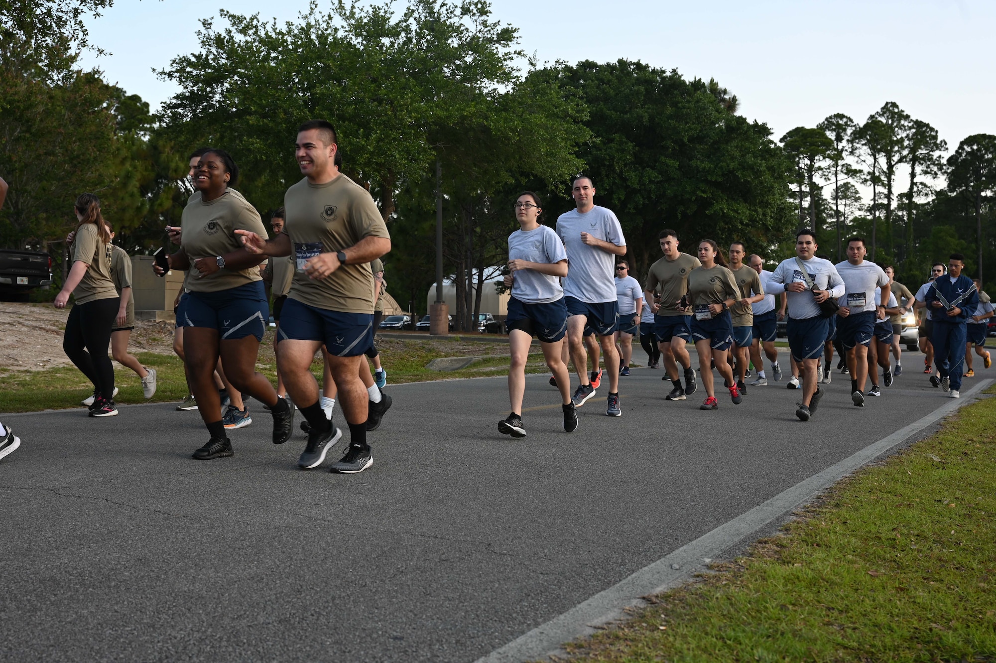 Air Commandos begin their run during Air Force Special Operations Command's Run to Honor 5K Run/Ruck at Hurlburt Field, Florida May 13, 2022. The command hosts the run/ruck as a tribute to AFSOC Airmen who have made the ultimate sacrifice in service to their country. (U.S. Air Force photo by Staff Sgt. Brandon Esau)