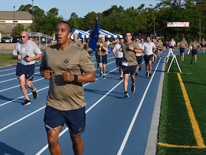 Air Commandos participate in the 2022 Run to Honor 5K Run/Ruck at Hurlburt Field, Florida May 13, 2022. The command hosts the run/ruck as a tribute to AFSOC Airmen who have made the ultimate sacrifice in service to their country. (U.S. Air Force photo by Staff Sgt. Brandon Esau)