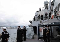 Sailors man the rails aboard the Arleigh Burke-class guided-missile destroyer USS Porter (DDG 78), as it prepares to pull into Oslo, Norway, for a scheduled port visit, May 22, 2022. Porter is on a scheduled deployment in the U.S. Naval Forces Europe area of operations, employed by U.S. Sixth Fleet to defend U.S., Allied and Partner interests.