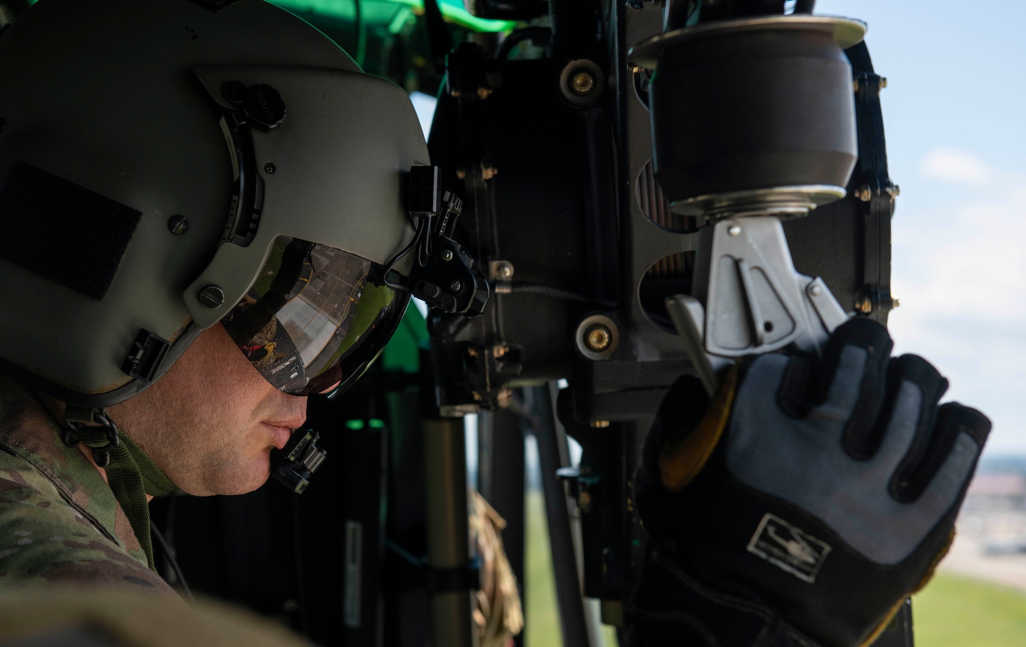 Tech. Sgt. Kevin Bell, 459th Airlift Squadron flight engineer, looks over the flightline during Friendship Festival 2022, at Yokota Air Base, Japan May 22, 2022. The two-day festival was an opportunity for visitors to learn more about the U.S. and Japan bilateral partnership, while strengthening the bonds between Yokota and the local communities. Yokota was able to host the event with the support of Japan Self-Defense Force, sister services and the local community. (U.S. Air Force photo by Senior Airman Hannah Bean)