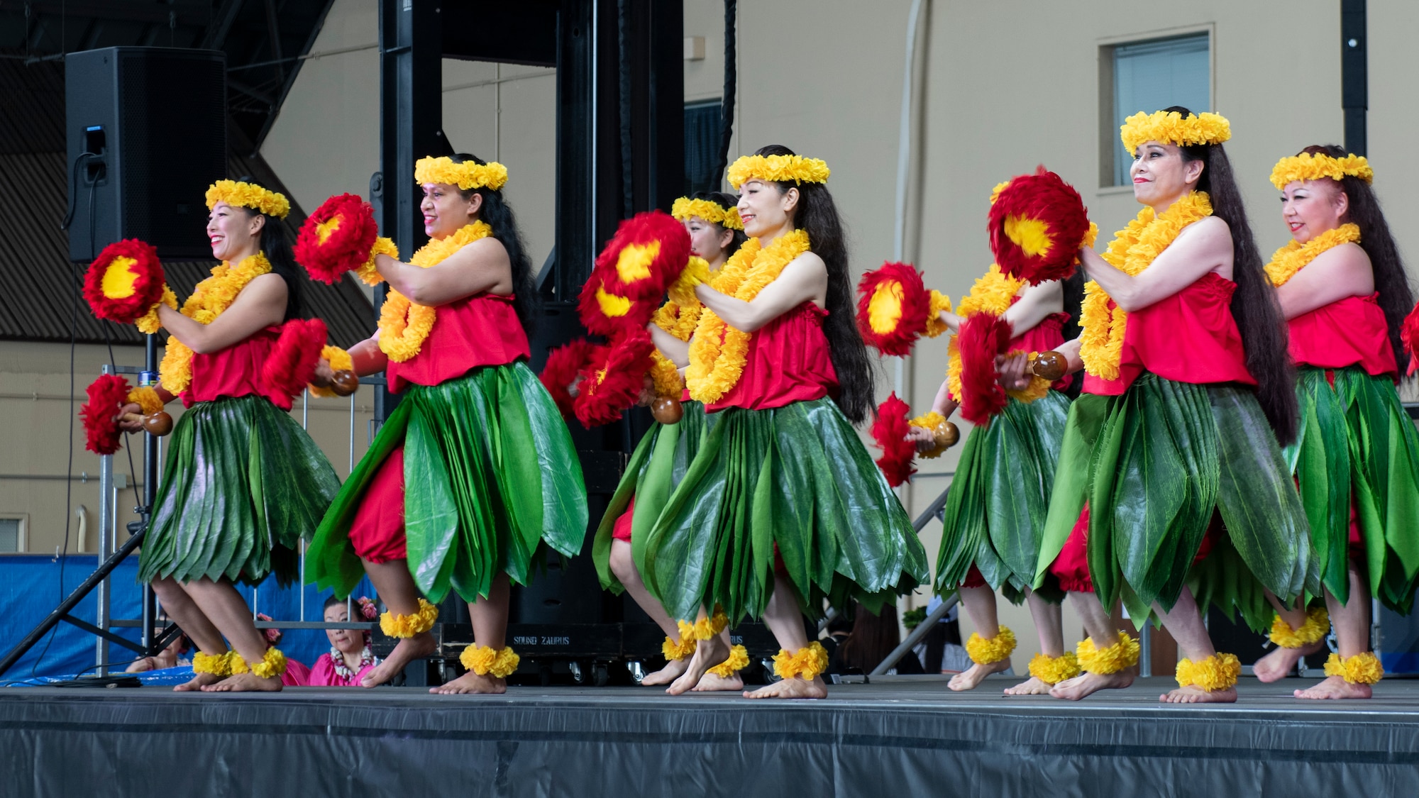 A troop of hula dancers perform on the main stage during the Friendship Festival 2022, at Yokota Air Base, Japan, May 21, 2022. The two-day festival was an opportunity for visitors to learn more about the U.S. and Japan bilateral partnership, while strengthening the bonds between Yokota and the local communities. Yokota was able to host the event with the support of Japanese Self-Defense Force, sister services and the local community. (U.S. Air Force photo by Staff Sgt. Ryan Lackey)