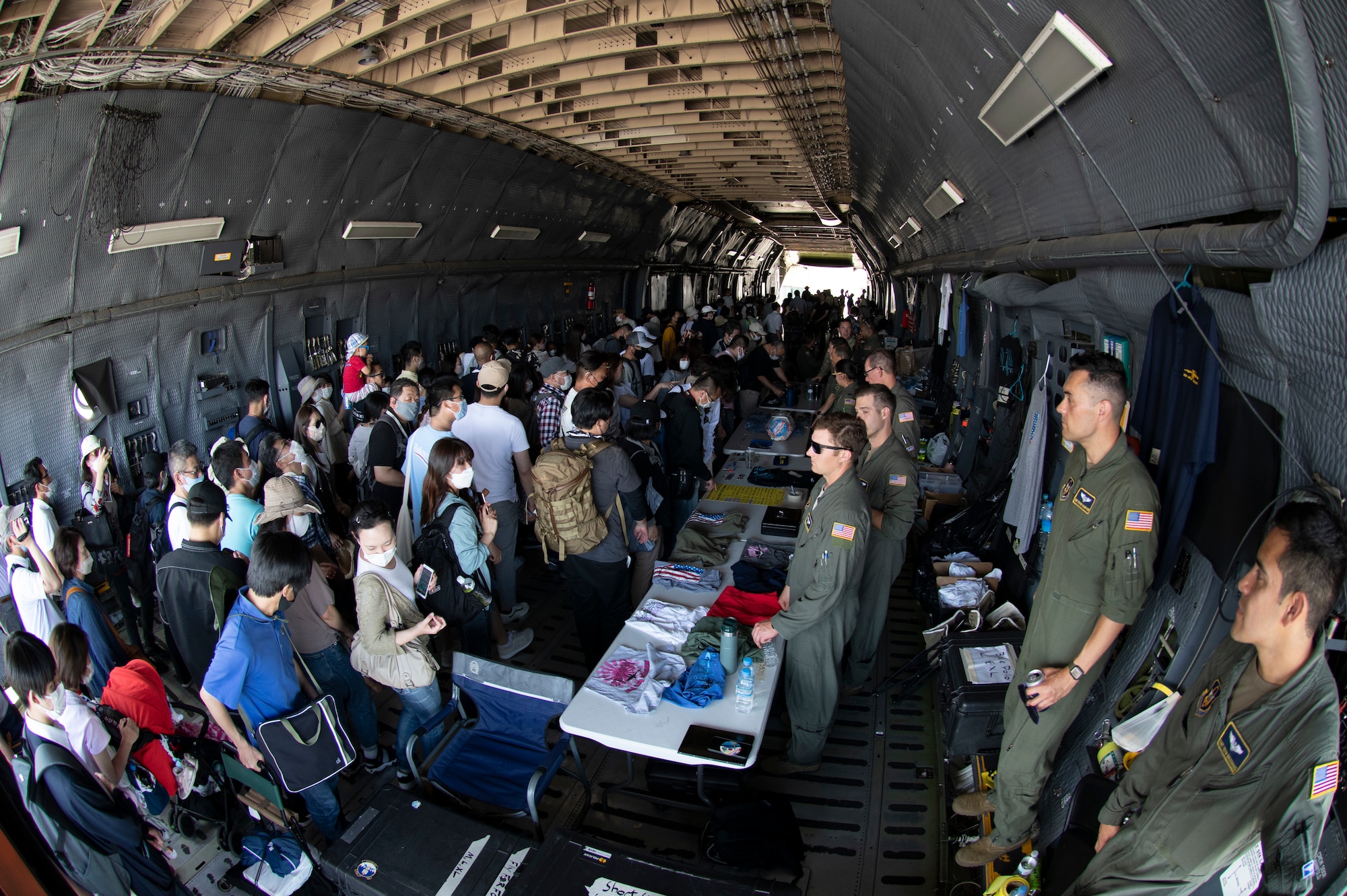 Attendees walk through a C-5M Super Galaxy assigned to the 312th Airlift Squadron from Travis Air Force Base, California, during Friendship Festival 2022, at Yokota Air Base, Japan, May 22. The two-day festival was an opportunity for visitors to learn more about the U.S. and Japan bilateral partnership, while strengthening the bonds between Yokota and the local communities. Yokota was able to host the event with the support of Japan Self-Defense Force, sister services and the local community. (U.S. Air Force photo by Tech. Sgt. Joshua Edwards)